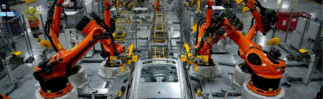 Robot arms on a car production line