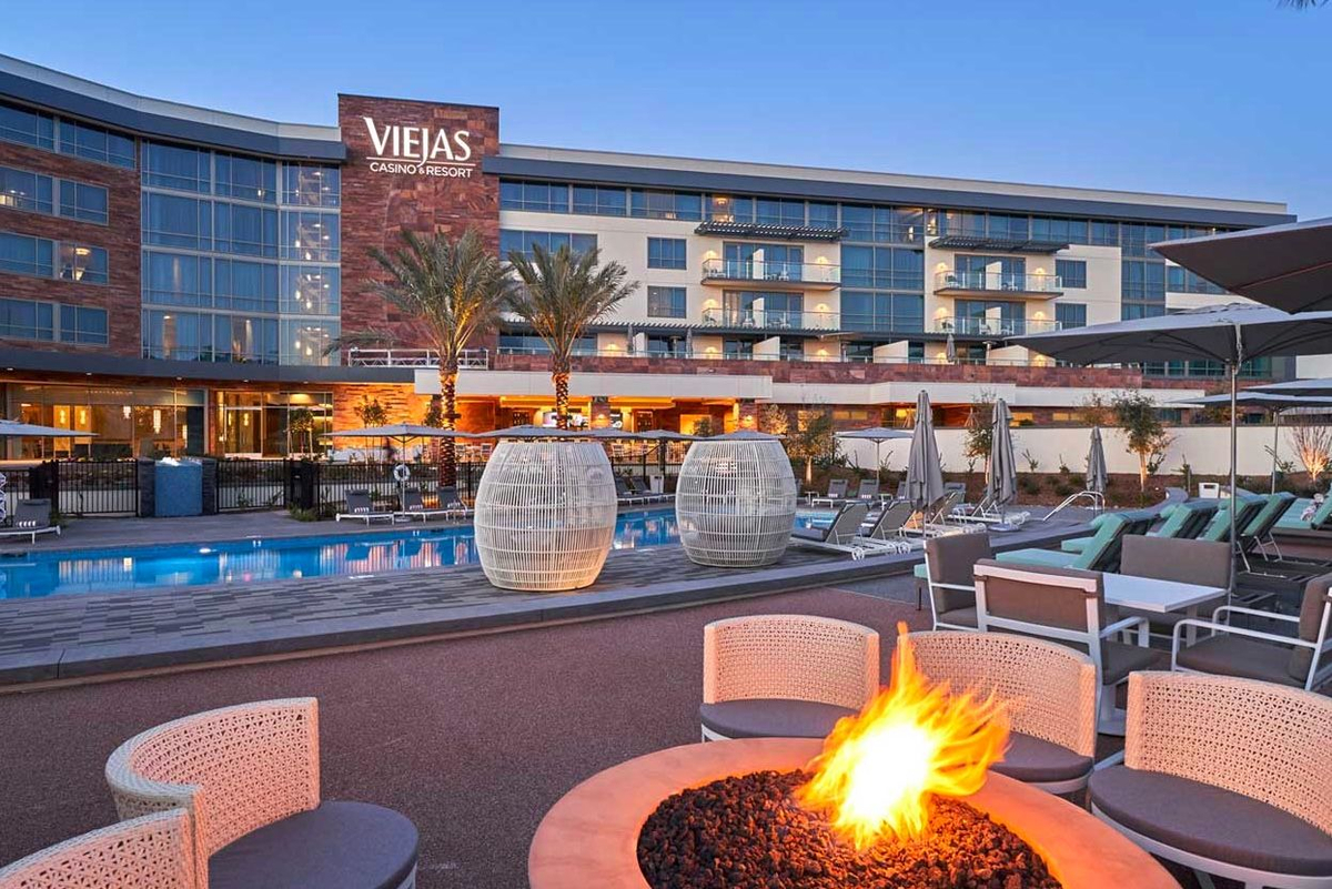 Unwind by the firepit at Viejas Casino & Resort's hotel pool area. A perfect blend of relaxation and warmth awaits you